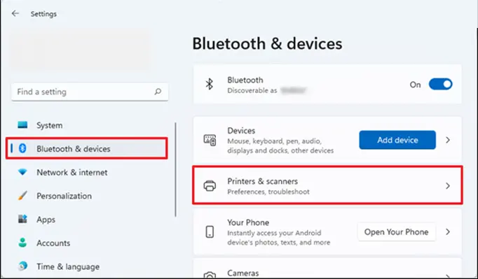 Bạn quay lại ứng dụng Settings, rồi chọn Bluetooth & devices, sau đó nhấp vào Printers & scanners.